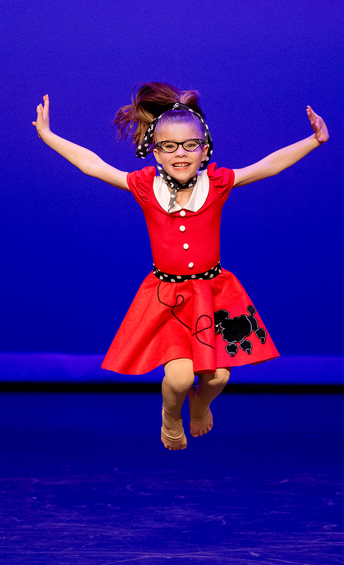 young acrobatic dancer jumping