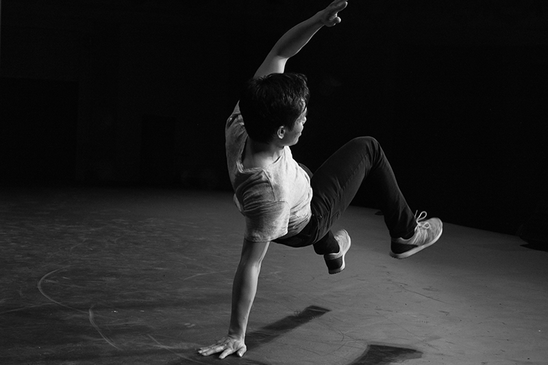 Young solo break dancer performing