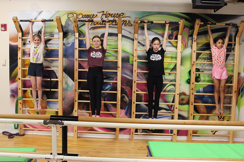 Students in Dance Conditioning class using exercise equipment