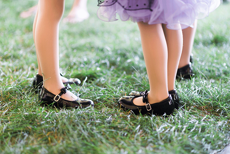 two young dancers wearing tap shoes